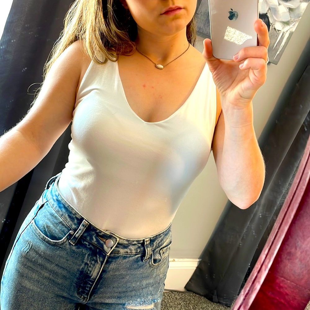 New small white soft bodysuit with cute back